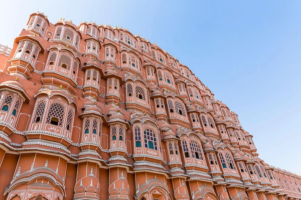 pink building with blue sky in background
